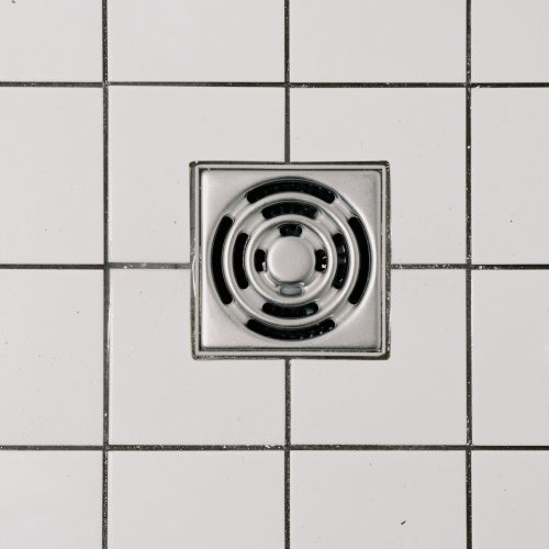 官方指定2023ob直播app(2023趋势信息) - close up of white tiles and a drain